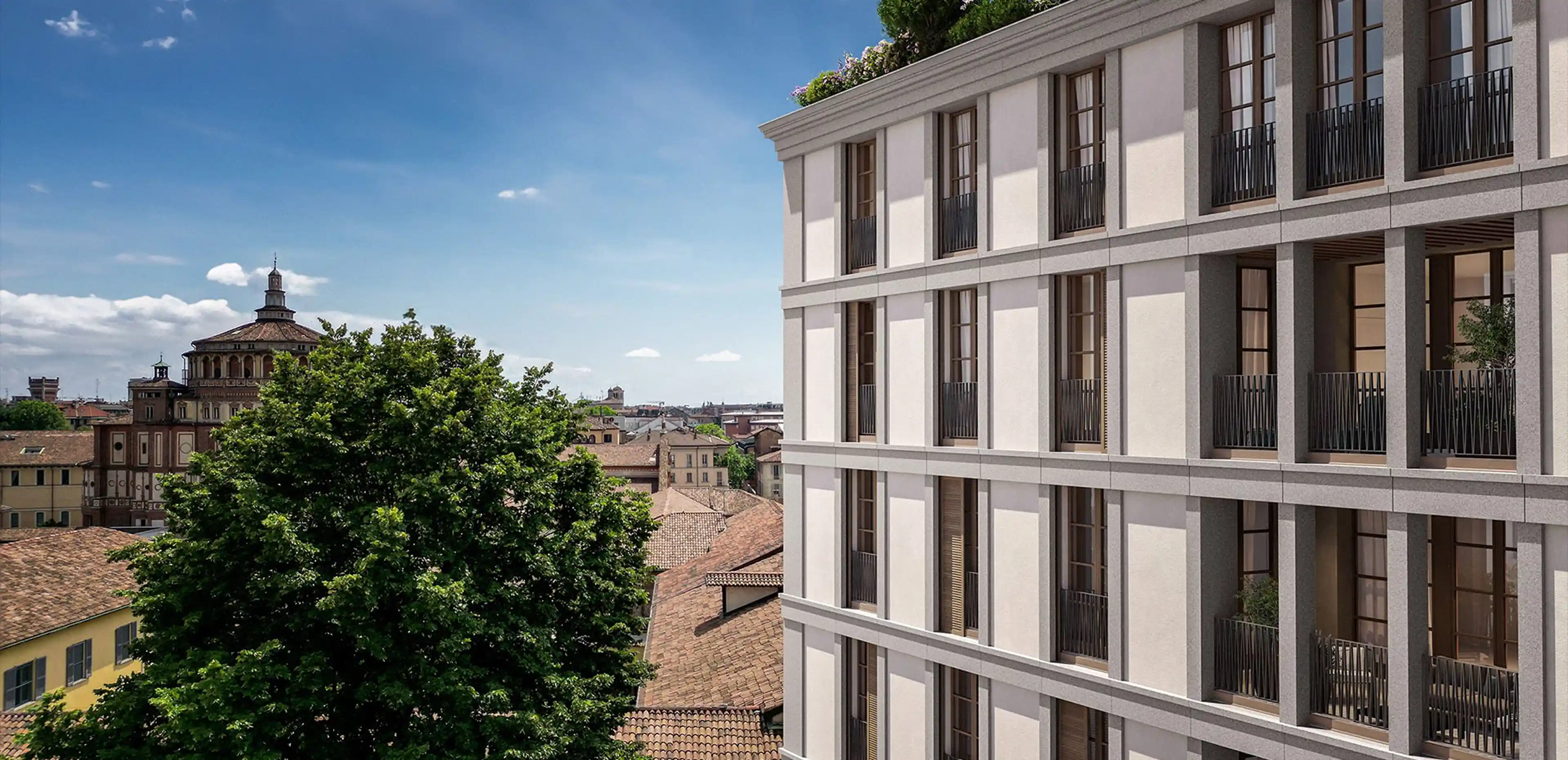 Render della facciata del palazzo di Via Sassi nel centro storico di Milano: rivestimento in Granito Bianco di Montorfano levigato e granigliato con lesene verticali, balconi in ferro e roof garden con vegetazione - progetto Arassociati, fornitura e posa in opera Trapattoni Marmi