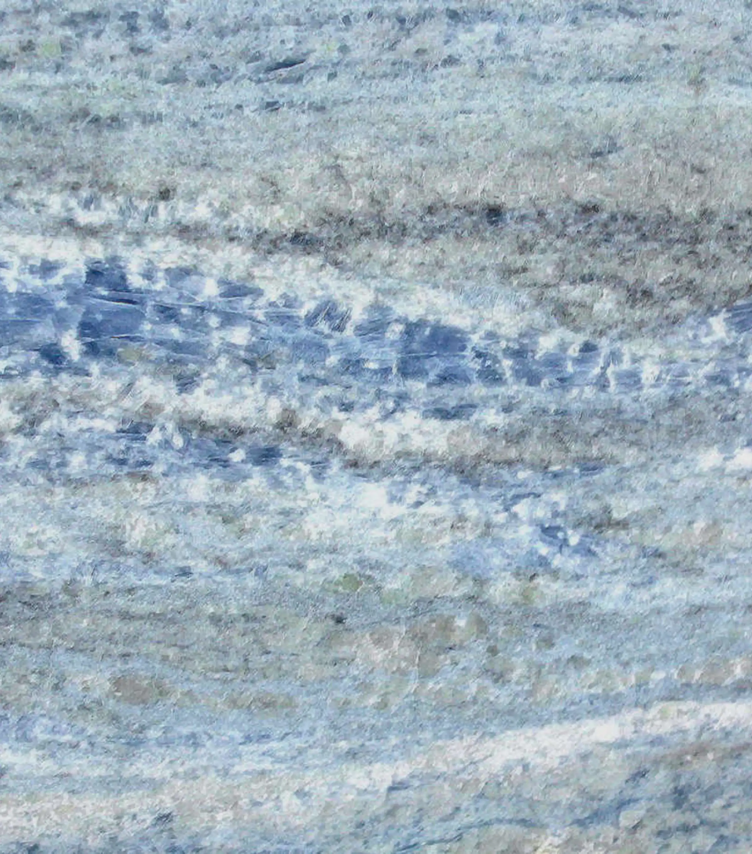 Campione di Calcite Blue con venatura azzurra intensa su fondo bianco utilizzato per il rivestimento a parete dello showroom Brera in Via Fiori Chiari a Milano - fornitura Trapattoni Marmi